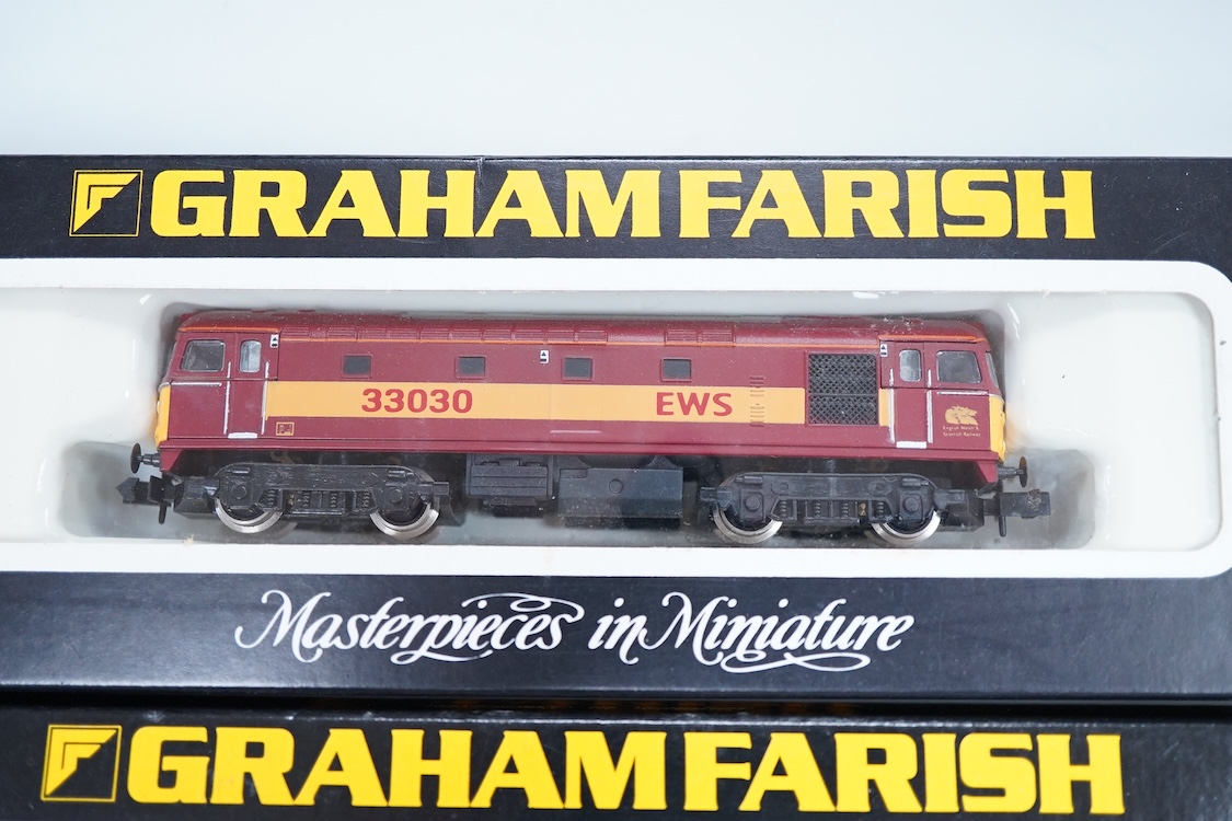 Four boxed Graham Farish N gauge railway Class 33 Bo-Bo diesel-electric locomotives; a BR, 33 205 (8317), a BR, 33 056 (8316), a BR, Sultan 33 025 (8312) and an EWS, 33030 (831A).